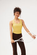 Top deportivo espalda nadadora libre textura rib Fieder - Amarillo vista frontal