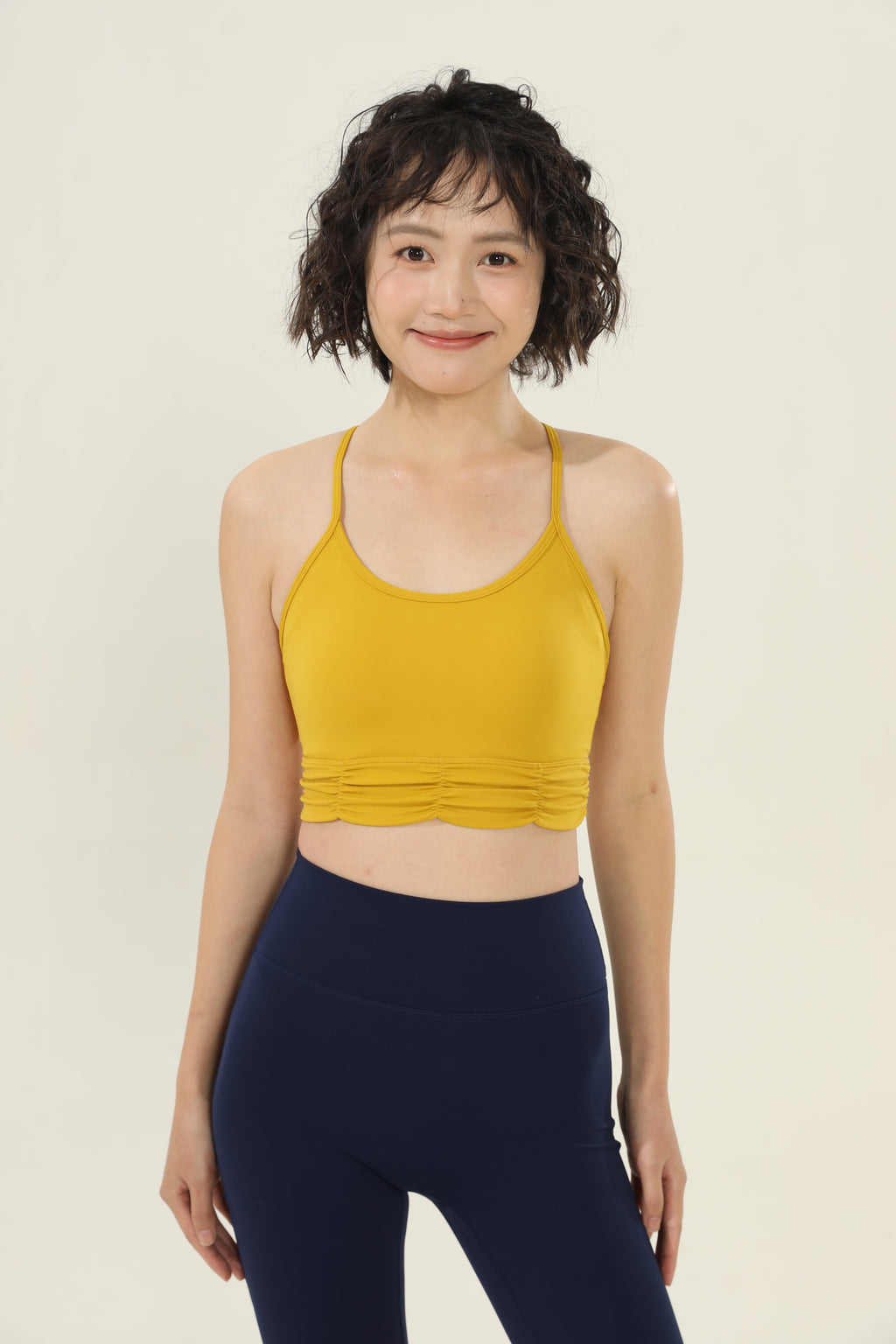 Top deportivo mujer espalda en X crop amarillo - Fieder	