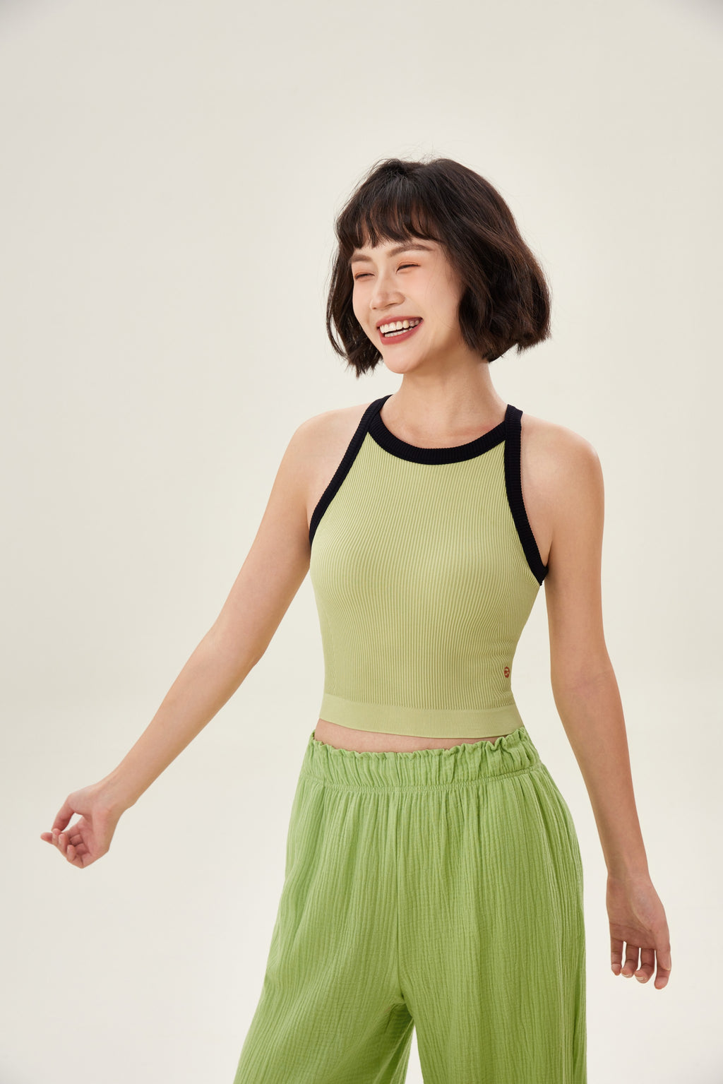 Top deportivo mujer cuello halter canalé verde pálido espalda - Fieder