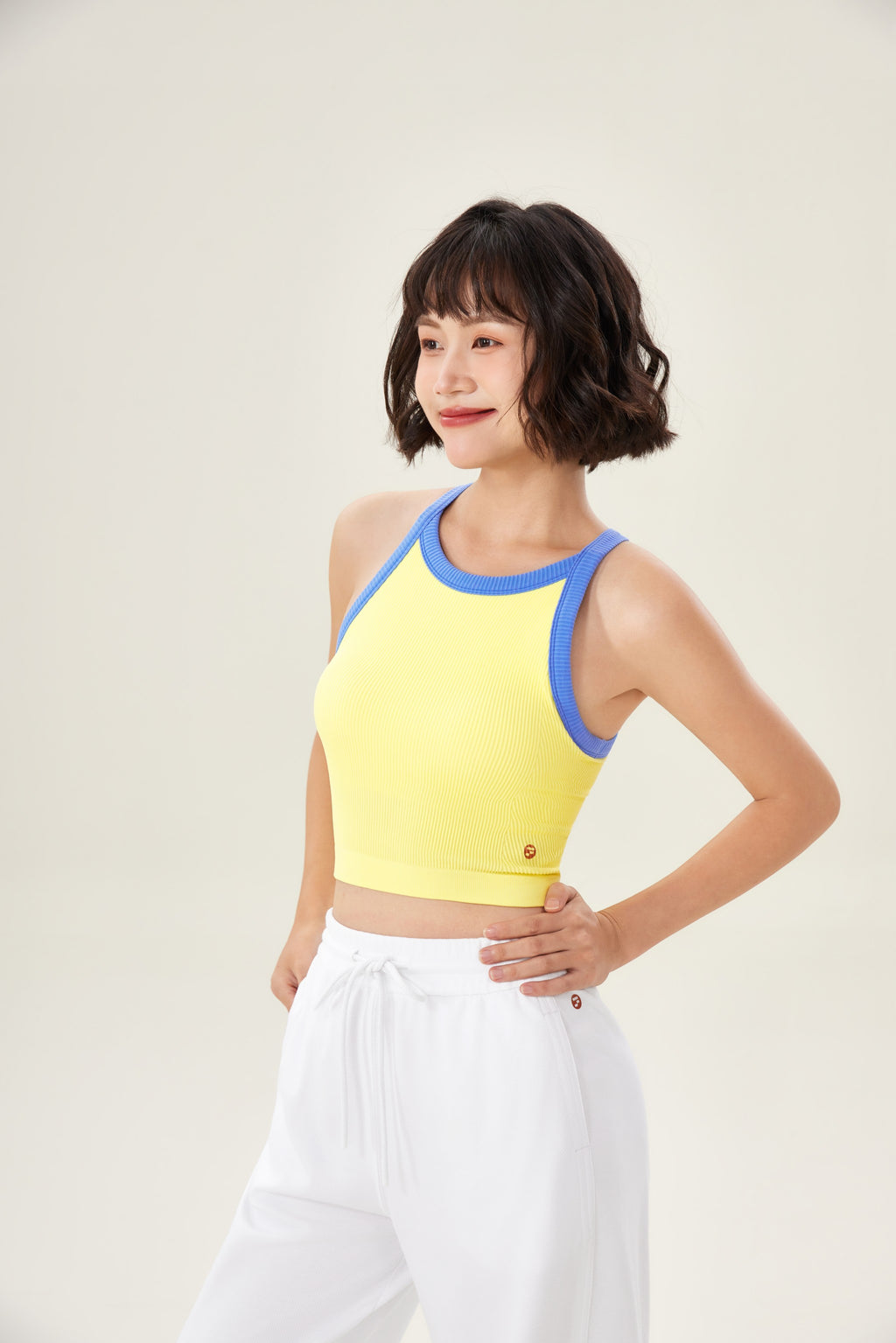 Top deportivo mujer cuello halter canalé amarillo - Fieder