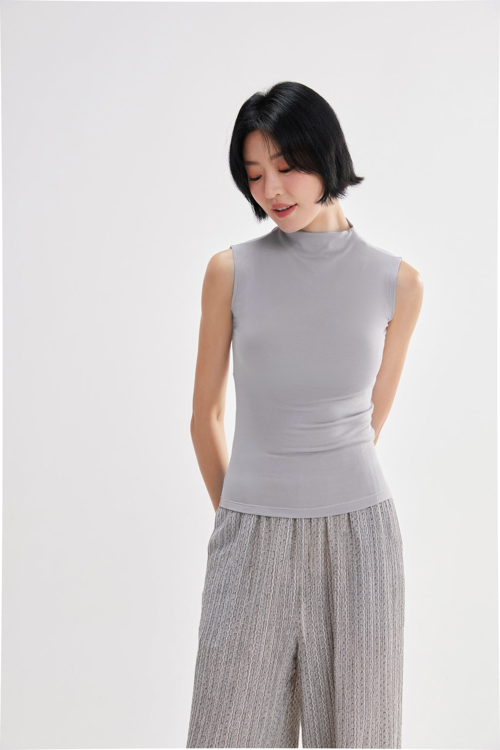Top mujer cuello alto sin mangas plateado lateral - Fieder	