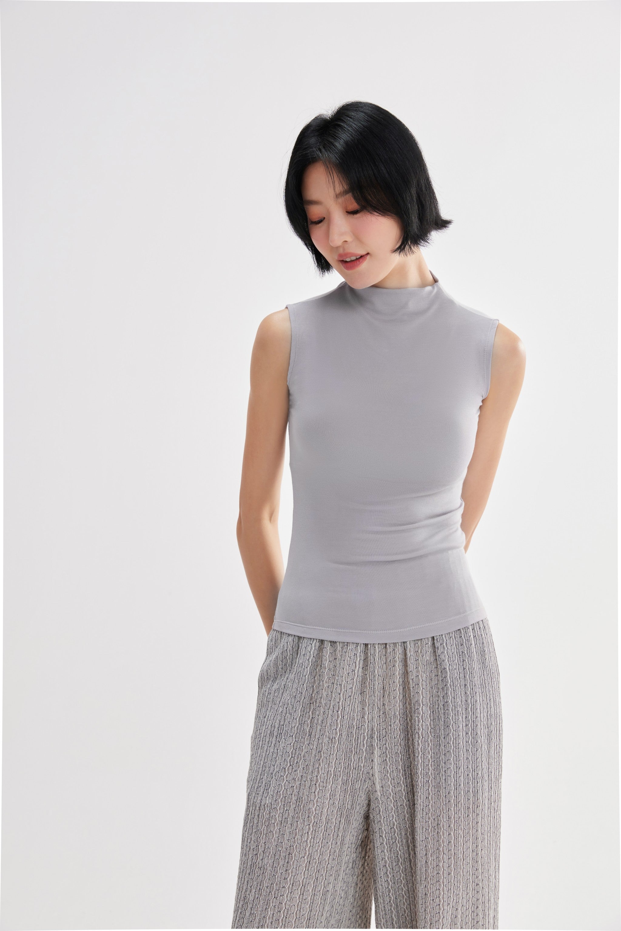 Top mujer cuello alto sin mangas plateado lateral - Fieder	